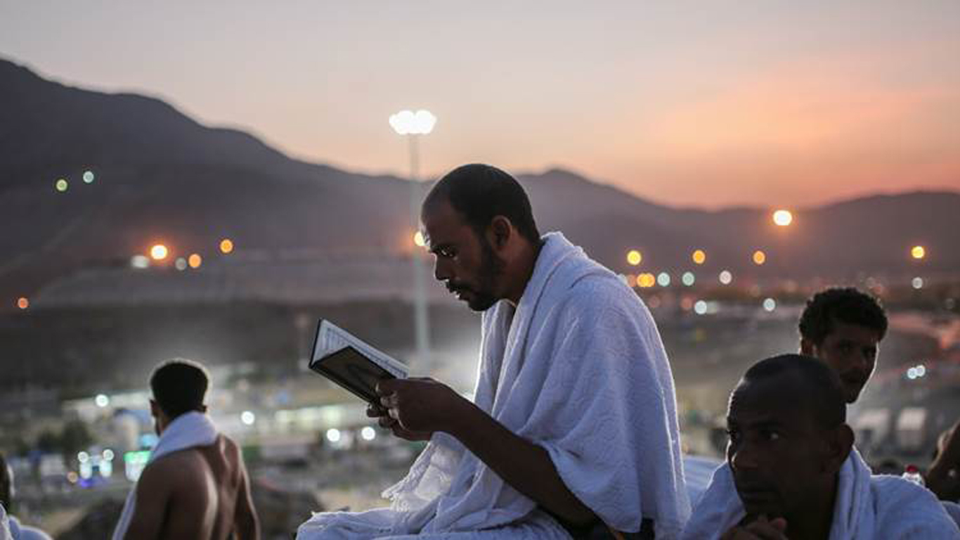 Muslim pilgrims pray on a rocky hill called the Mountain of Mercy, on the Plain of Arafat, near the holy city of Mecca, Saudi Arabia, Wednesday, Sept. 23, 2015 during the hajj pilgrimage. Mount Arafat, marked by a white pillar, is where Islam's Prophet Muhammad is believed to have delivered his last sermon to tens of thousands of followers some 1,400 years ago, calling on Muslims to unite. (AP Photo/Mosa'ab Elshamy)
