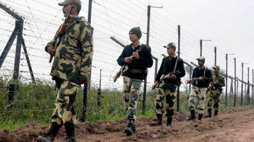 Pathankot: Border Security Force (BSF) soldiers patrol the border fence at Bamial border in Pathankot on Monday. The security has been beefed up in the wake of the recent attacks. PTI Photo (PTI1_4_2016_000243B)