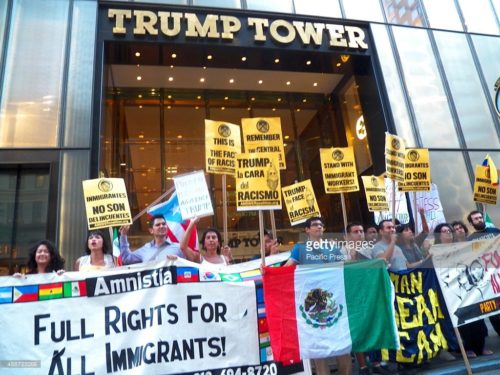 NEW YORK, UNITED STATES - 2015/09/16: Mexican protesters bring banner and placards during their protest outside the Trump's Tower. The Mexican community in New York unites and stage protest against Donald Trump's comments on immigrants and their connections to crimes. (Photo by Mark Apollo/Pacific Press/LightRocket via Getty Images)